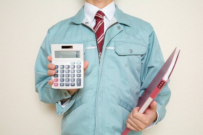 作業服の人と電卓